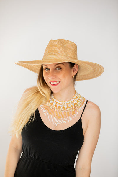 Cascading gold and white beaded hat necklace